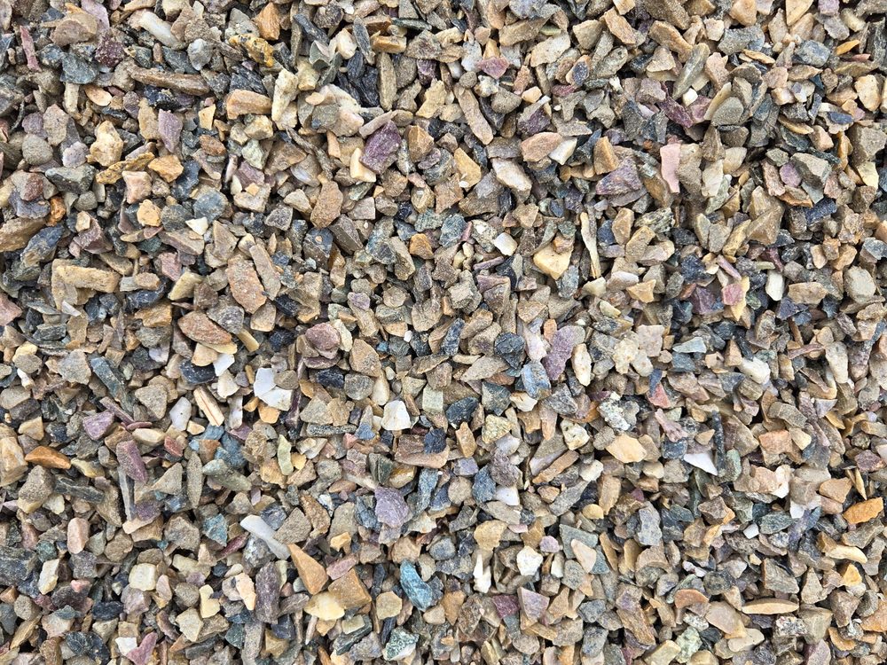 Chip finishing top coat Prince George BC — colorful rock shards with a little sand